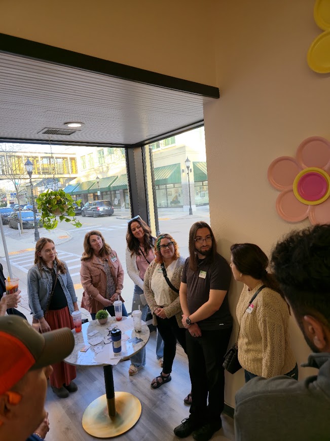 Attendees mingling inside Idyllic Bubble Tea House