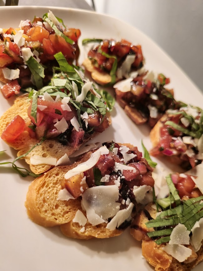 Bruschetta on toasted crostini served at a Local Social event