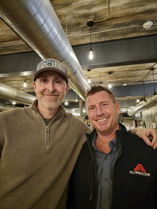 Ben Prescher, owner of Alternative Design and Construction, with organizer Rick Neuman at Smoke on the Water